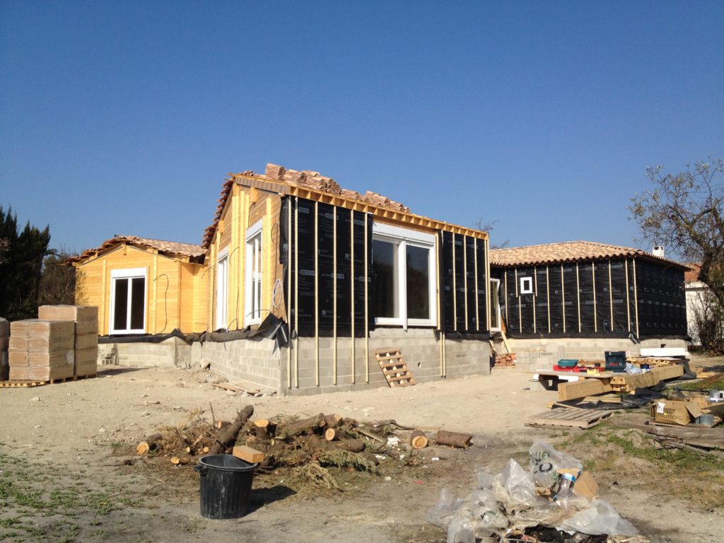 reconstruction d'une maison en bois massif